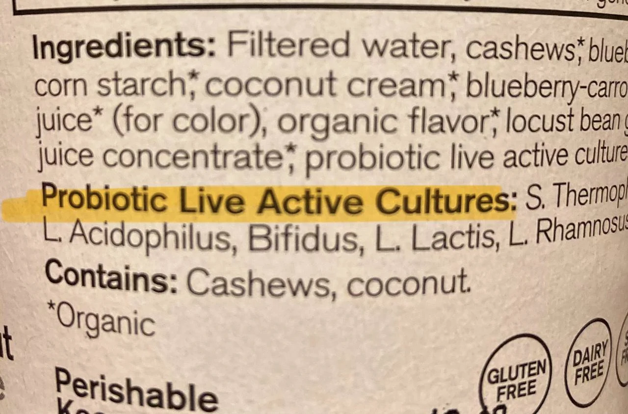 Close-up of a yogurt label showing the live and active cultures statement
